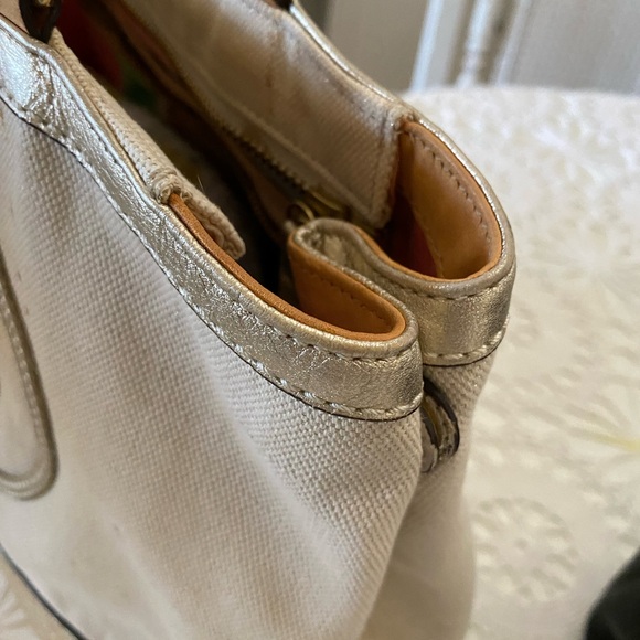 Lovely coach purse with gold accents so pretty  inside is plaid material. - Picture 5 of 9